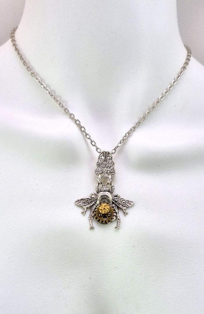 Sterling silver filled Victorian antique or reproduction work from original mold embellished with vintage clockworks and mechanisms.