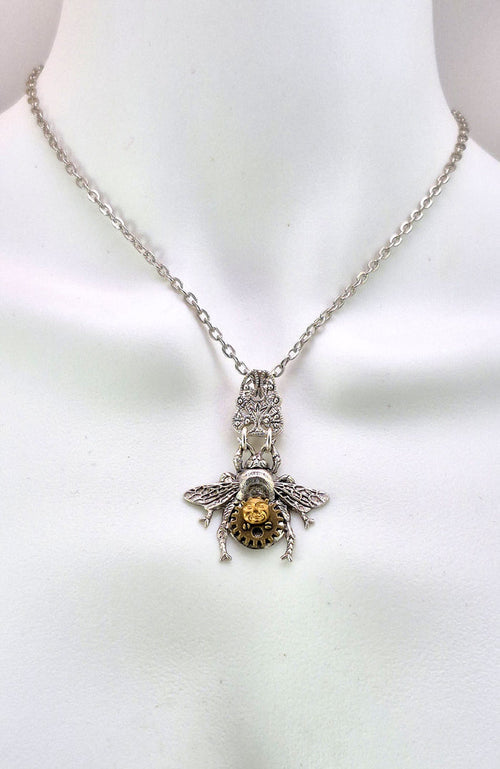 Sterling silver filled Victorian antique or reproduction work from original mold embellished with vintage clockworks and mechanisms.