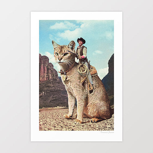 Cat Lone Ranger surreal art print — cowboy in full Western gear with dark vest black hat gun holster and coiled lasso sitting astride an enormous fully-saddled sandy tabby cat in a dramatic red rock canyon, towering sandstone formations and wide blue sky behind, vintage 1960s Western movie still aesthetic, surreal cat cowboy wall art for man caves ranch houses and cat lover interiors
