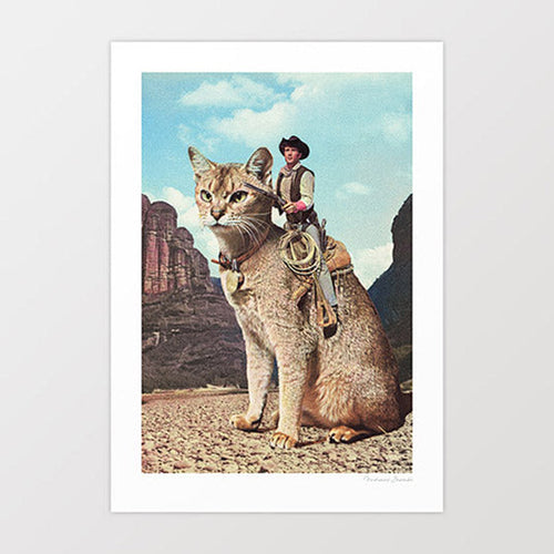Cat Lone Ranger surreal art print — cowboy in full Western gear with dark vest black hat gun holster and coiled lasso sitting astride an enormous fully-saddled sandy tabby cat in a dramatic red rock canyon, towering sandstone formations and wide blue sky behind, vintage 1960s Western movie still aesthetic, surreal cat cowboy wall art for man caves ranch houses and cat lover interiors