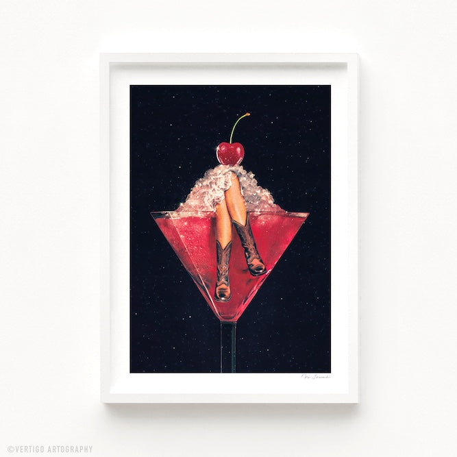 Cherry Cowgirl Margarita art print second view — cowgirl boots legs up in a deep red cherry cocktail martini glass with crushed ice and maraschino cherry, cosmic starry black background, sassy western bar cart decor for Nashville bachelorette parties cowgirl core interiors and girls night gift ideas