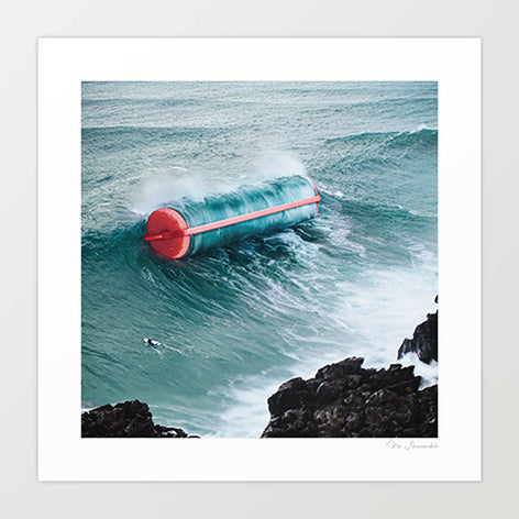 Curl Power surreal art print — giant red hair curler riding the face of a massive dark breaking ocean wave crashing against black rocky coastline, the churning wave wrapping around the curler exactly as hair would, a lone surfer on the same wave dwarfed by the scale, dramatic storm sea photography, surreal triple pun on surfing curls hair curls and girl power, coastal wall art for surf shops hair salons and beach houses