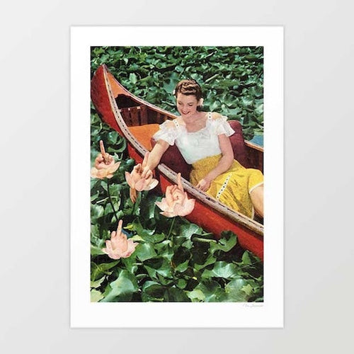 Fingers for Lily surreal art print — smiling 1960s woman in white peasant blouse and bright yellow skirt sitting in a dark red wooden canoe surrounded by lush green lily pads and soft pink lotus flowers, reaching forward toward blooms that are revealed to be small human hands with fingers pointing upward growing among the water lilies, warm vintage 1940s colour photography, surreal romantic botanical wall art for holiday homes, beach houses and whimsical interiors