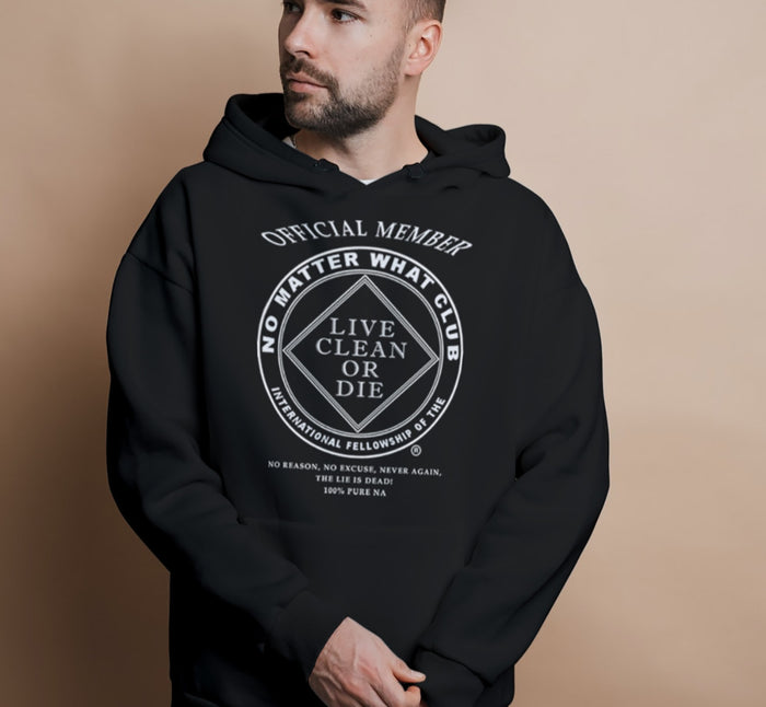 A male model wearing a black hoodie with white text and graphic on the front, featuring a double-lined hood, ribbed cuffs, and a pouch pocket.