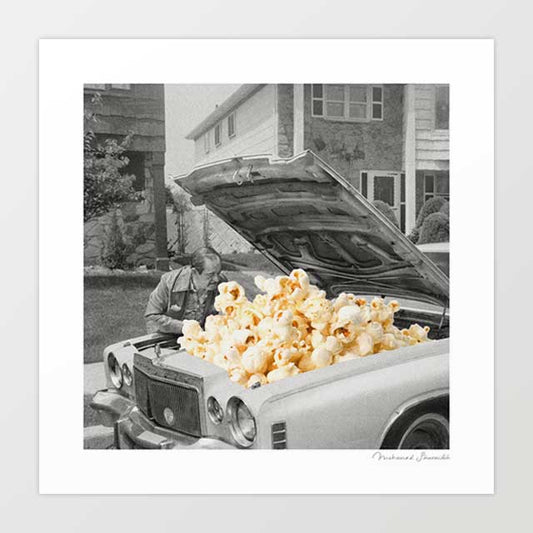 Pop the Hood surreal art print — mechanic opens a vintage 1960s car hood overflowing with popcorn, kitsch black and white retro wall art for man caves and movie rooms