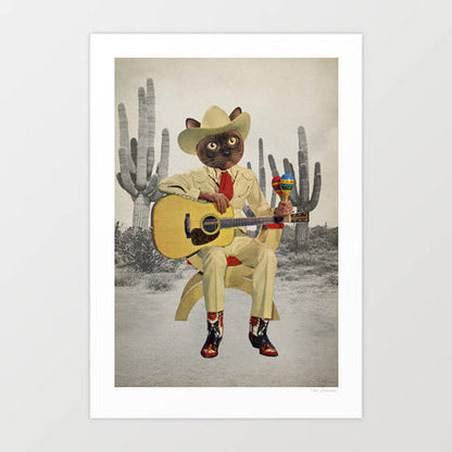 Y'all Ready for This Cat in the Desert surreal art print — wide-eyed Siamese cat in a cream Western suit and red tie seated on a wooden chair holding an acoustic guitar and colourful maraca, ornate red and black cowboy boots, dramatic greyscale saguaro cactus desert backdrop, surreal cowboy cat wall art for cat lovers, music lovers and western decor interiors